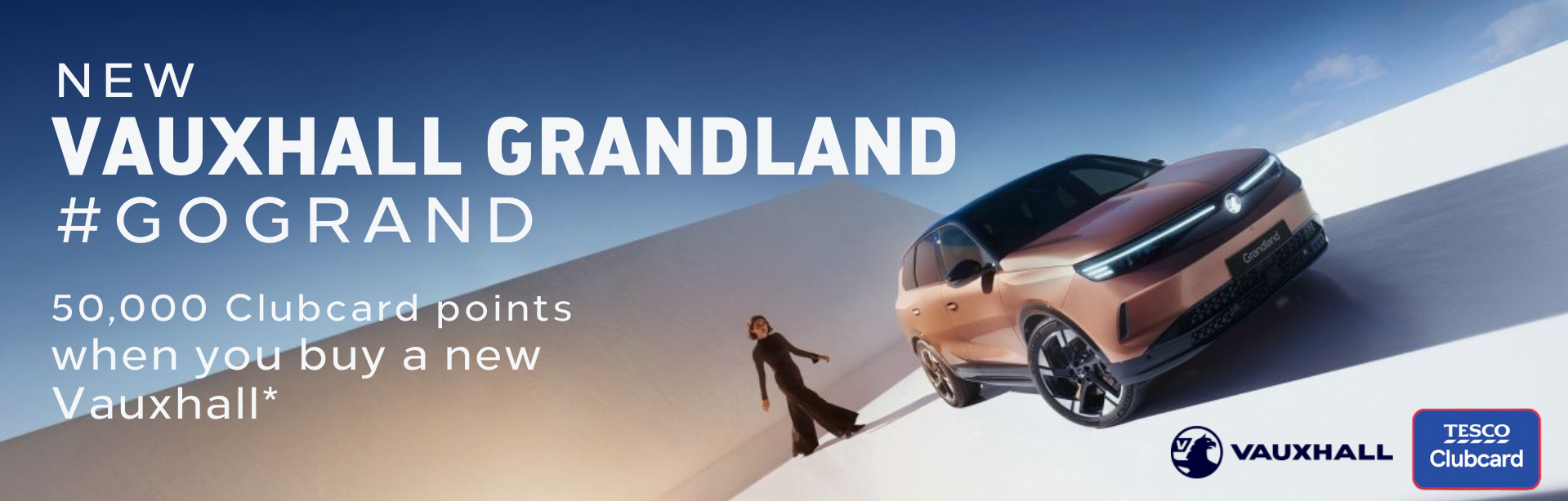 Vauxhall Grandland car with text offering Tesco Clubcard points for new purchases.
