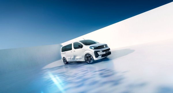White van driving on a reflective surface with a gradient blue sky.